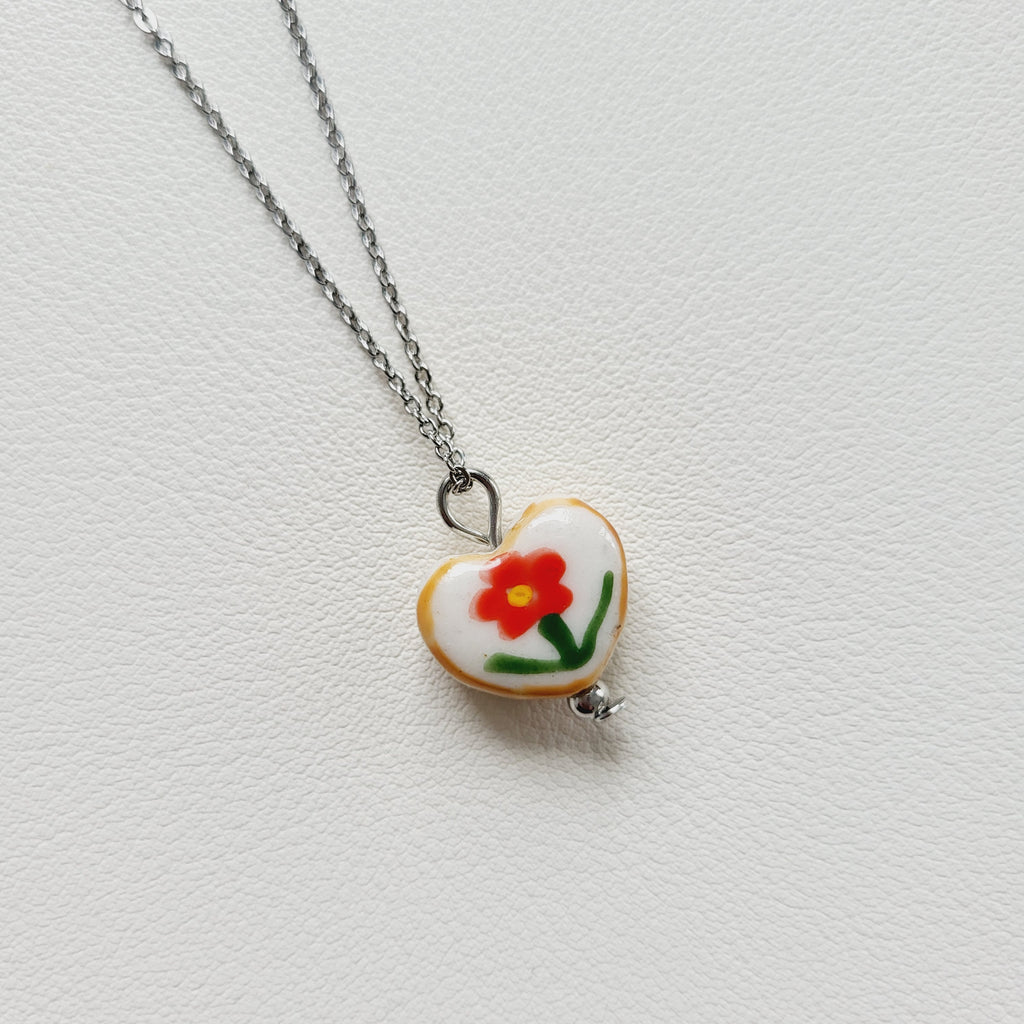 Flower design ceramic white heart charm with silver tone chain necklace (red)