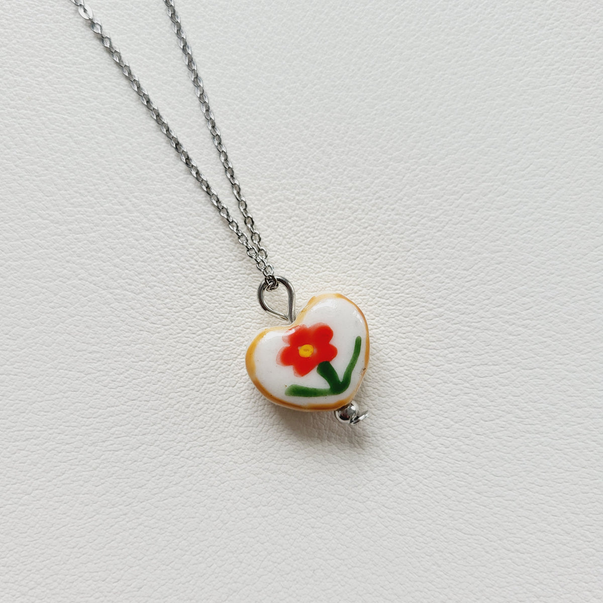 Flower design ceramic white heart charm with silver tone chain necklace (red)