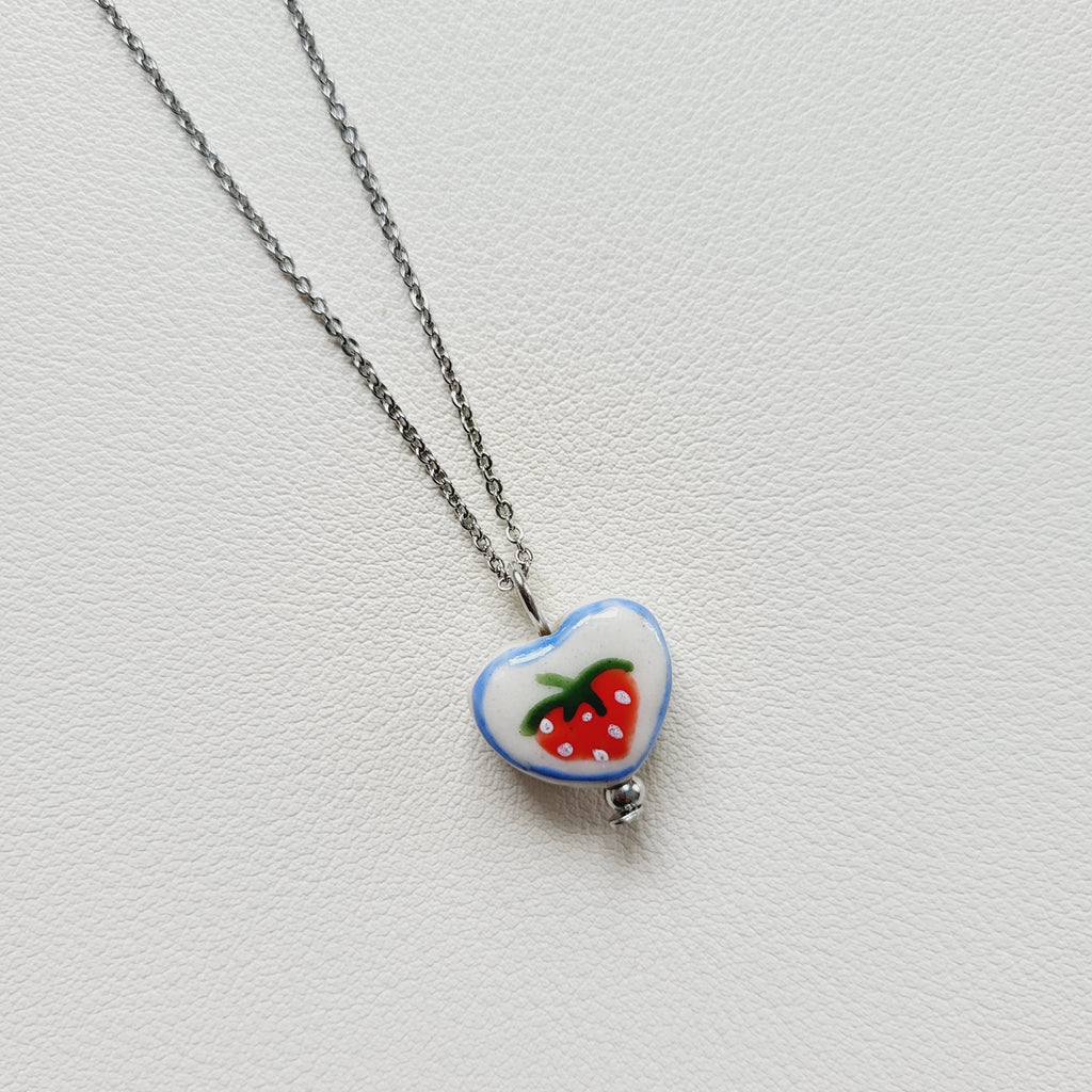 Strawberry design ceramic white heart charm with silver tone chain necklace