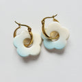 Flower charm gold tone hoop earrings