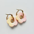 Flower charm gold tone hoop earrings