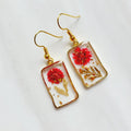 Gold tone red flower resin drop dangle earrings