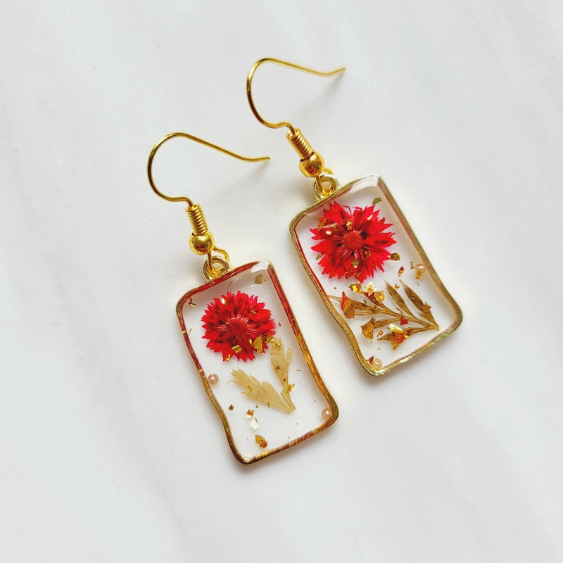 Gold tone red flower resin drop dangle earrings