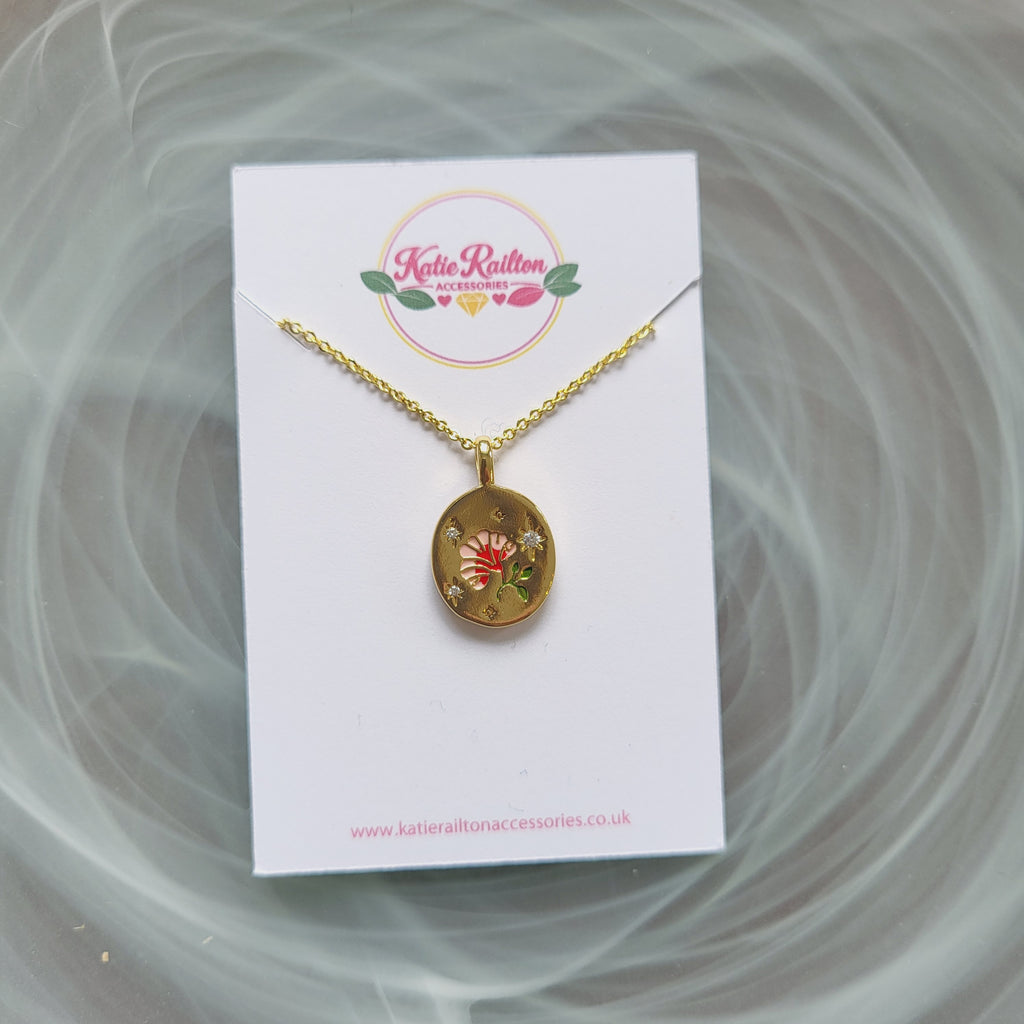 Gold tone enamel rose pendant necklace