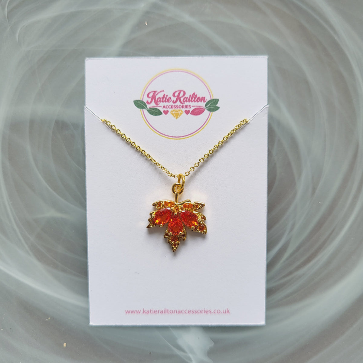 Gold tone amber leaf charm pendant necklace