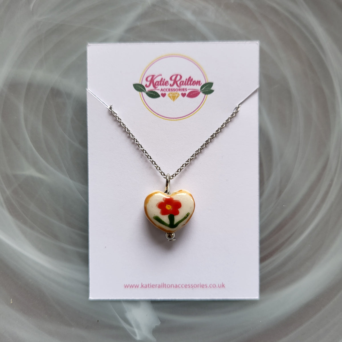 Flower design ceramic white heart charm with silver tone chain necklace (red)