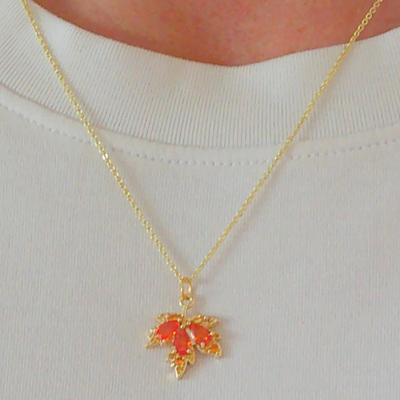 Gold tone amber leaf charm pendant necklace